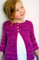 I like the simple gathered yoke of this sweater.