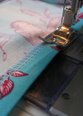 Sew hem with a ¼ inch seam, using the edge of the presser foot as a guide.